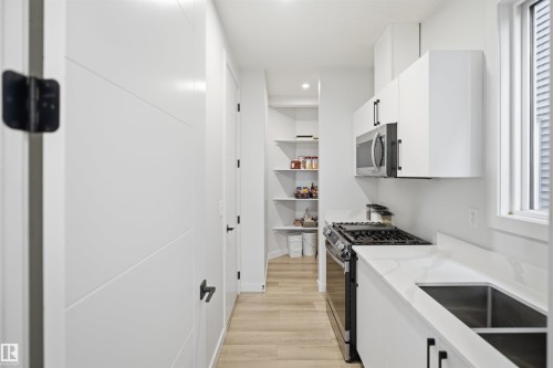 5493 Kootook Road Sw, Edmonton, AB - Indoor Photo Showing Kitchen