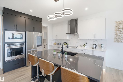 5493 Kootook Road Sw, Edmonton, AB - Indoor Photo Showing Kitchen With Stainless Steel Kitchen With Upgraded Kitchen