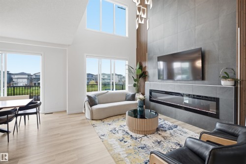 5493 Kootook Road Sw, Edmonton, AB - Indoor Photo Showing Living Room With Fireplace