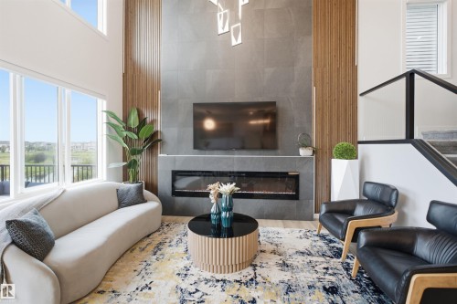 5493 Kootook Road Sw, Edmonton, AB - Indoor Photo Showing Living Room With Fireplace