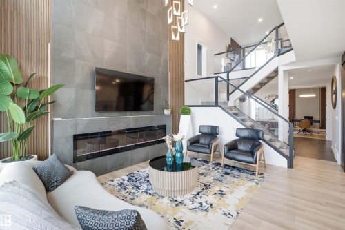 5493 Kootook Road Sw, Edmonton, AB - Indoor Photo Showing Living Room With Fireplace