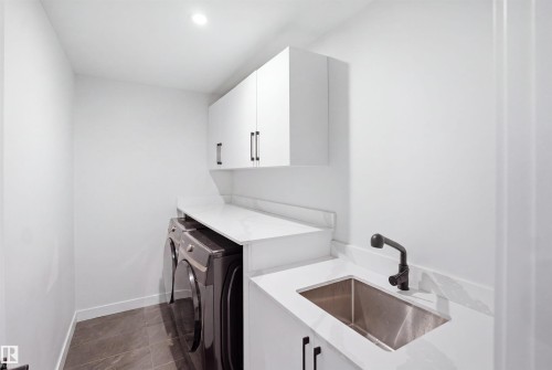 5493 Kootook Road Sw, Edmonton, AB - Indoor Photo Showing Laundry Room