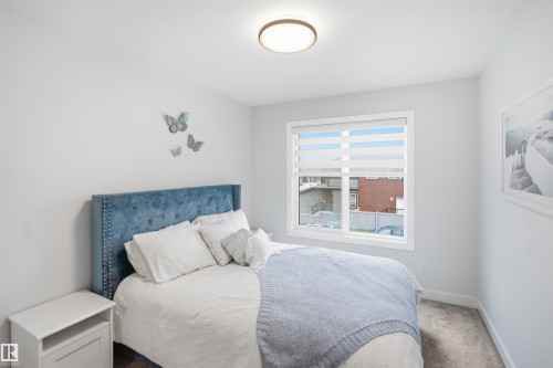 5493 Kootook Road Sw, Edmonton, AB - Indoor Photo Showing Bedroom