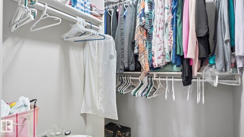 Closet featuring white shelving, a continuous clothes rod, and light gray wall paint - 4105 36A Avenue Nw, Edmonton, AB - Indoor With Storage