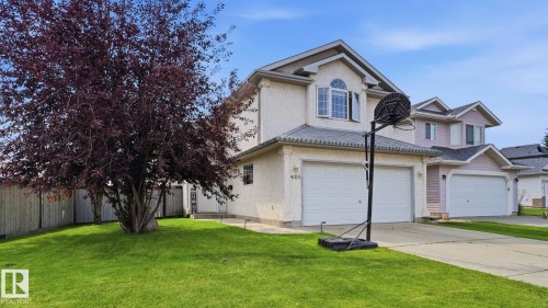 Two-story residence featuring a textured stucco exterior and a two-car garage - 4105 36A Avenue Nw, Edmonton, AB - Outdoor