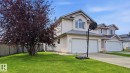 Two-story residence featuring a textured stucco exterior and a two-car garage - 4105 36A Avenue Nw, Edmonton, AB  - Outdoor 