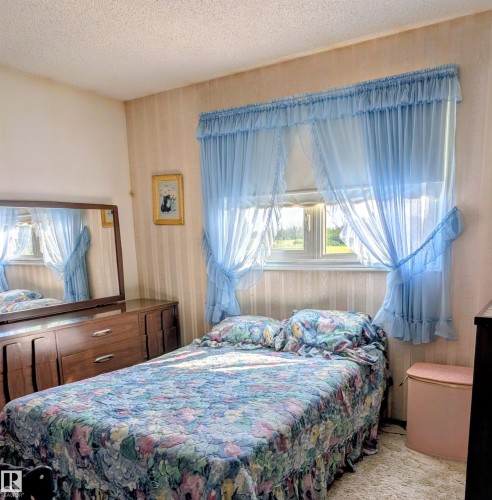 Additional content - 6014 50 Street, Vegreville, AB - Indoor Photo Showing Bedroom