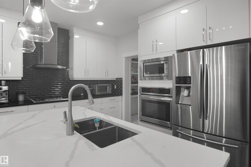 17252 71 Street Nw, Edmonton, AB - Indoor Photo Showing Kitchen With Double Sink With Upgraded Kitchen