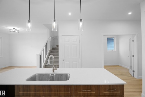 621 Ashgrove Circle, Leduc, AB - Indoor Photo Showing Kitchen With Double Sink