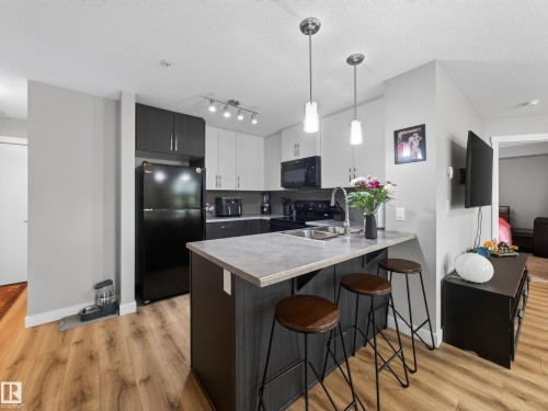 #121 3670 139 Av Nw, Edmonton, AB - Indoor Photo Showing Kitchen With Double Sink