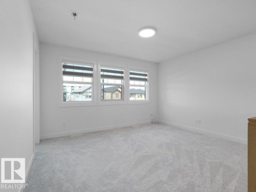 1077 Cristall Crescent Sw, Edmonton, AB - Indoor Photo Showing Other Room