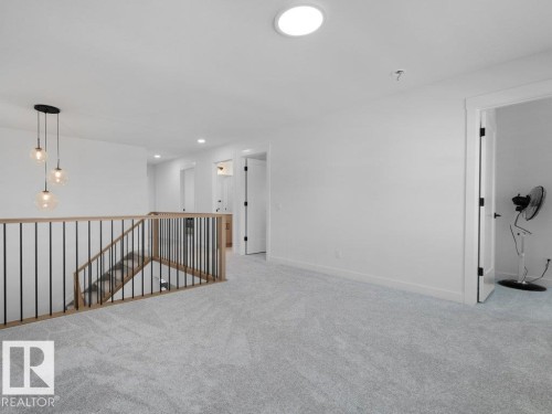 1077 Cristall Crescent Sw, Edmonton, AB - Indoor Photo Showing Other Room