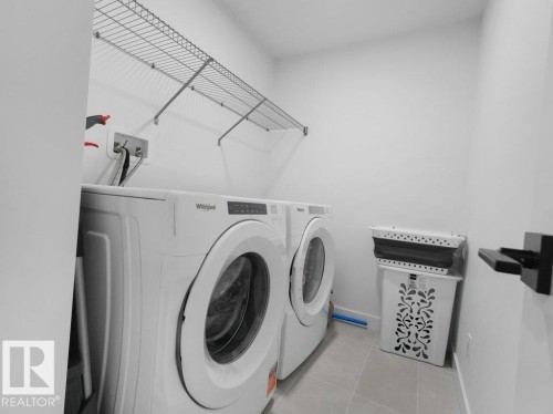 1077 Cristall Crescent Sw, Edmonton, AB - Indoor Photo Showing Laundry Room