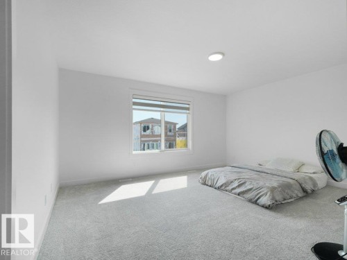 1077 Cristall Crescent Sw, Edmonton, AB - Indoor Photo Showing Bedroom
