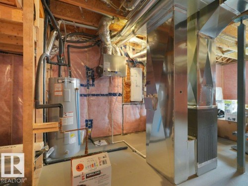 1077 Cristall Crescent Sw, Edmonton, AB - Indoor Photo Showing Basement