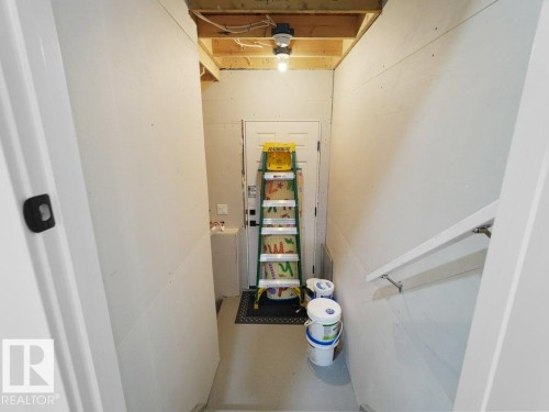 1077 Cristall Crescent Sw, Edmonton, AB - Indoor Photo Showing Basement