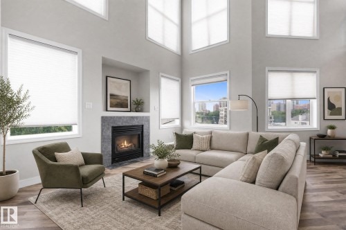 #505 10346 117 St Nw, Edmonton, AB - Indoor Photo Showing Living Room With Fireplace
