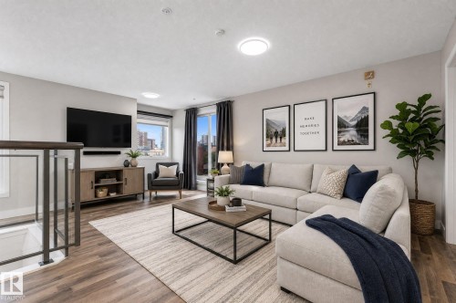 Bonus loft/room great for movie nights - #505 10346 117 St Nw, Edmonton, AB - Indoor Photo Showing Living Room