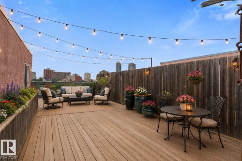 Large patio for entertaining and watching the fireworks! - #505 10346 117 St Nw, Edmonton, AB - Outdoor With Deck Patio Veranda