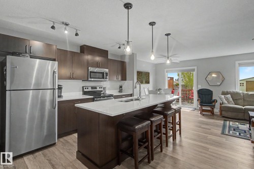 7147 Cardinal Way Sw, Edmonton, AB - Indoor Photo Showing Kitchen With Stainless Steel Kitchen With Double Sink With Upgraded Kitchen