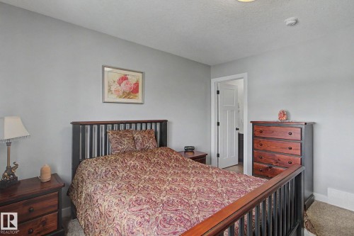 7147 Cardinal Way Sw, Edmonton, AB - Indoor Photo Showing Bedroom
