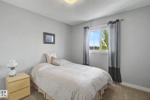 7147 Cardinal Way Sw, Edmonton, AB - Indoor Photo Showing Bedroom