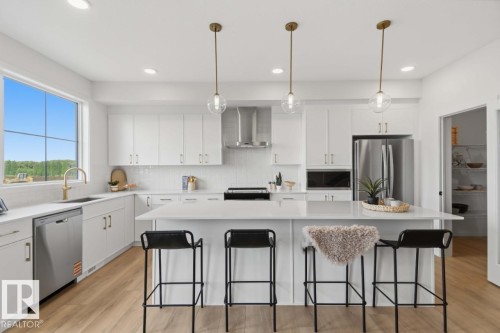 7105 50A Avenue, Beaumont, AB - Indoor Photo Showing Kitchen With Stainless Steel Kitchen With Upgraded Kitchen