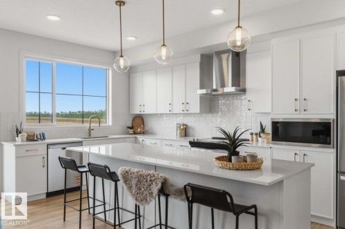 7105 50A Avenue, Beaumont, AB - Indoor Photo Showing Kitchen With Upgraded Kitchen