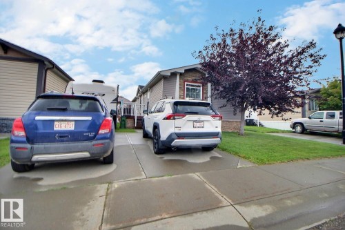 Paved driveway with dedicated parking space - 417 Oak Wood Crescent Northwest, Edmonton, AB - Outdoor
