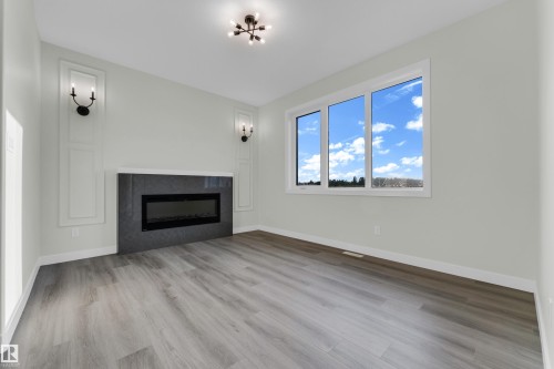 70 Covell Common, Spruce Grove, AB - Indoor Photo Showing Living Room With Fireplace