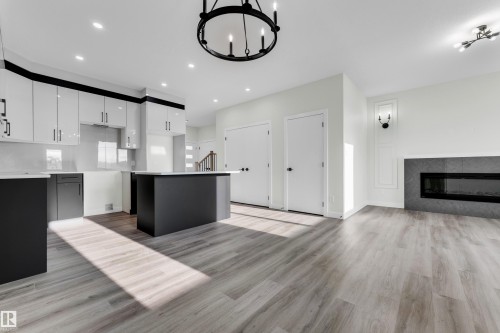 70 Covell Common, Spruce Grove, AB - Indoor Photo Showing Kitchen With Fireplace With Upgraded Kitchen