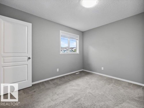 #56 8209 217 St Nw, Edmonton, AB - Indoor Photo Showing Other Room
