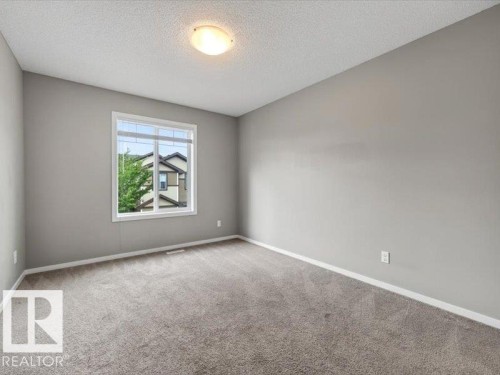 #56 8209 217 St Nw, Edmonton, AB - Indoor Photo Showing Other Room