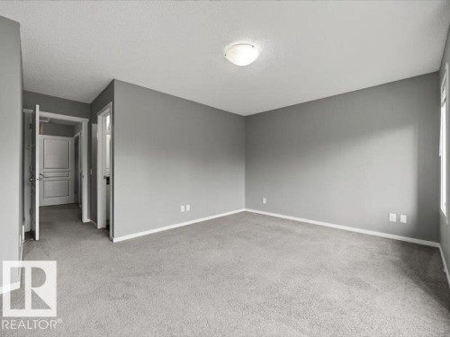 #56 8209 217 St Nw, Edmonton, AB - Indoor Photo Showing Other Room