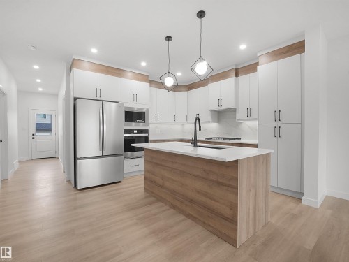 Beaumont, AB - Indoor Photo Showing Kitchen With Upgraded Kitchen