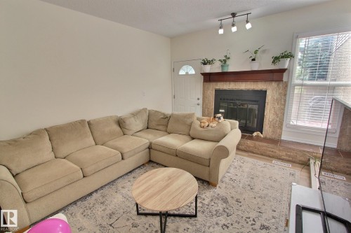 17004 100 Street Nw, Edmonton, AB - Indoor Photo Showing Living Room With Fireplace