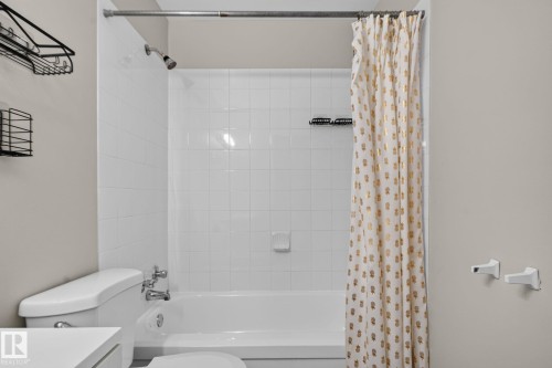 Bathtub with white subway tile surround and chrome fixtures - 17775 95 Street Nw, Edmonton, AB 