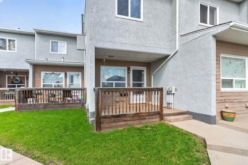 Private deck with wood-finish railing - 17775 95 Street Nw, Edmonton, AB 