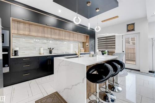 1827 17 Avenue Nw, Edmonton, AB - Indoor Photo Showing Kitchen With Upgraded Kitchen
