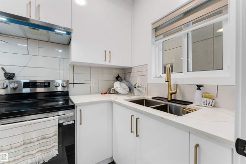 1827 17 Avenue Nw, Edmonton, AB - Indoor Photo Showing Kitchen With Double Sink With Upgraded Kitchen