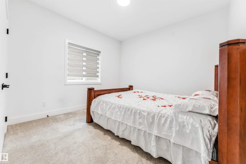 1827 17 Avenue Nw, Edmonton, AB - Indoor Photo Showing Bedroom