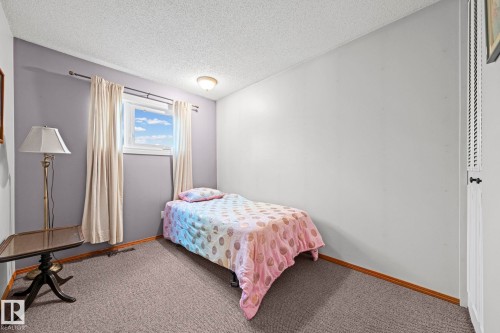 Window with white trim - 17908 92A Street Nw, Edmonton, AB - Indoor Photo Showing Bedroom