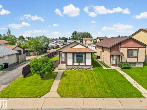 Front facade with white siding and brown trim - 17908 92A Street Nw, Edmonton, AB - Outdoor