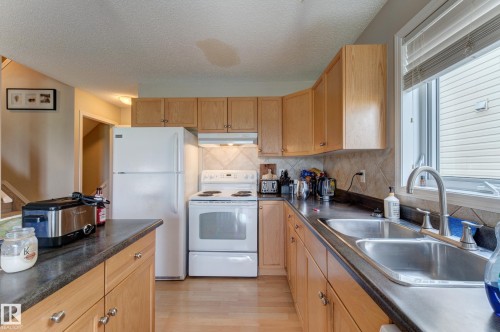 Additional content - 6218 1A Avenue Sw, Edmonton, AB - Indoor Photo Showing Kitchen With Double Sink