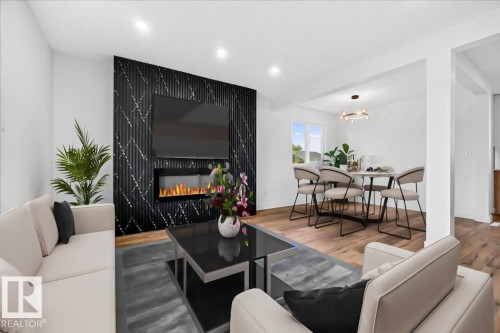7823 148 Avenue Nw, Edmonton, AB - Indoor Photo Showing Living Room With Fireplace