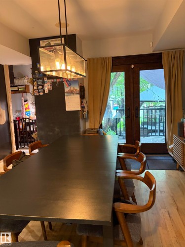 Hardwood-style flooring in a light tone - 10994 126 St Nw Nw, Edmonton, AB - Indoor