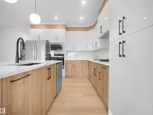 Beaumont, AB - Indoor Photo Showing Kitchen With Upgraded Kitchen