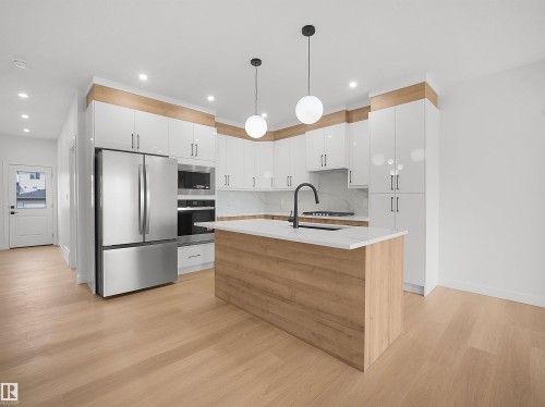 Beaumont, AB - Indoor Photo Showing Kitchen With Upgraded Kitchen