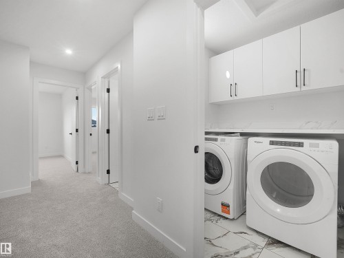Beaumont, AB - Indoor Photo Showing Laundry Room
