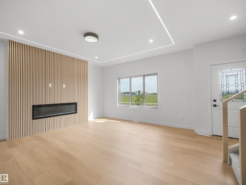 Beaumont, AB - Indoor With Fireplace